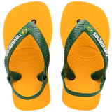 yellow flip flops with green heel straps featuring a brazil flag, top view