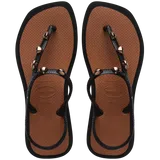 Top view of sandal with brown back straps, silver studs, and light brown sole